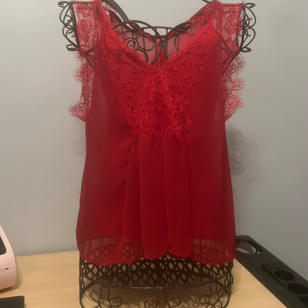 Red, lacy, delicate. Very pretty.
